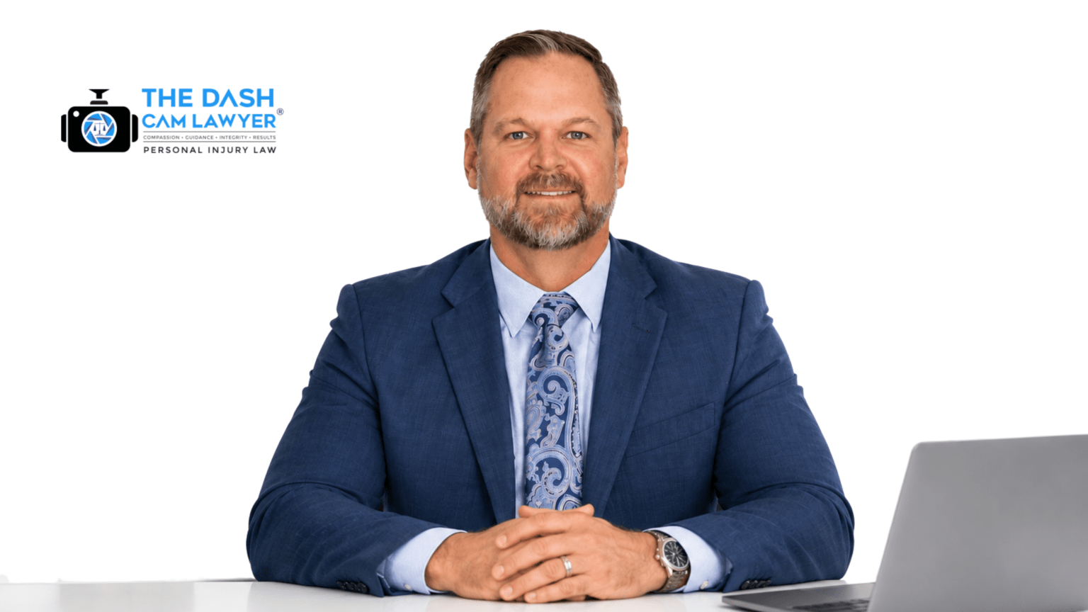 Contingency fee personal injury lawyer Shannon Sagan of The Dash Cam Lawyer sitting in his Palm Springs Florida office serving Palm Beach County injury victims