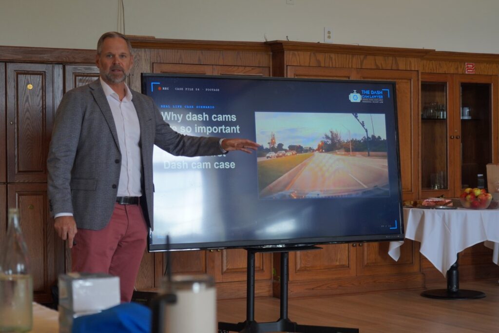 Shannon J. Sagan presenting on dash cams at BNI Synergy in Wellington